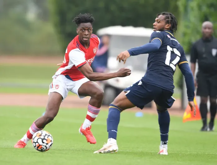 Framed Print : Arsenal's Sambi Outmaneuvers Millwall's Romeo in Pre-Season Friendly