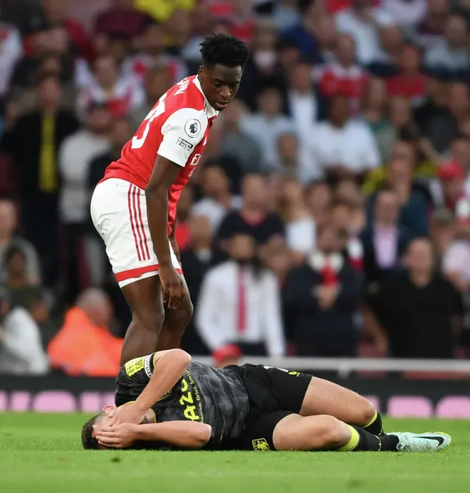 Framed Print : Arsenal's Sambi Stands Firm Against Aston Villa's McGinn in Intense Premier League Clash (2022-23) Framed Print : Arsenal's Sambi Stands Firm Against Aston Villa's McGinn in Intense Premier League Clash (2022-23)