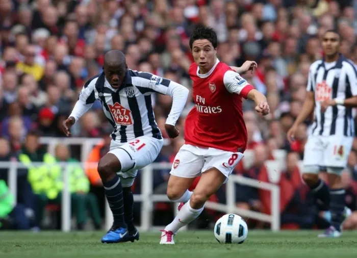 Framed Print : Arsenal's Samir Nasri Outshined by WBA's Youssouf Mulumbu: 2-3 Defeat at Emirates Stadium Framed Print : Arsenal's Samir Nasri Outshined by WBA's Youssouf Mulumbu: 2-3 Defeat at Emirates Stadium