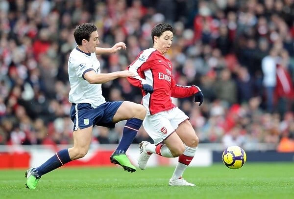 Arsenal's Samir Nasri Scores Against Stuart Downing and Aston Villa in 3-0 Premier League Victory at Emirates Stadium