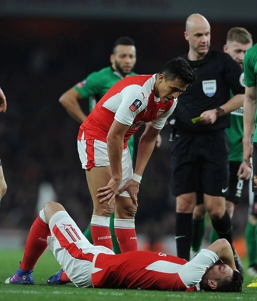 Arsenal's Sanchez and Ozil: A Moment of Support in FA Cup Quarter-Final