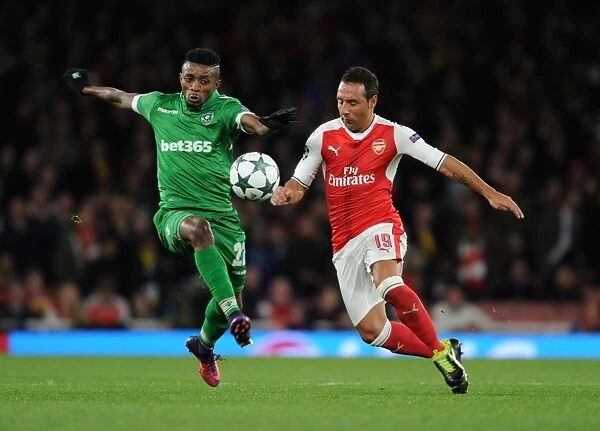 Arsenal's Santi Cazorla Breaks Past Ludogorets Cafu in Champions League Clash