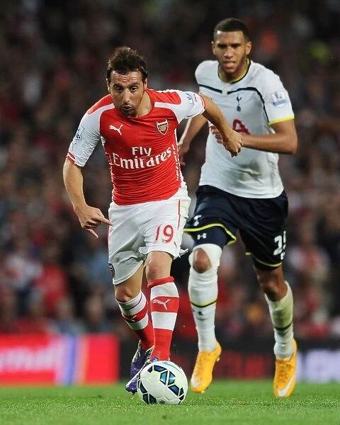 Arsenal's Santi Cazorla Faces Off Against Tottenham in the 2014-15 Premier League