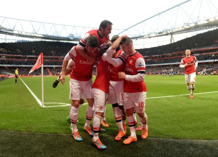 Framed Print : Arsenal's Santi Cazorla, Olivier Giroud, Mathieu Flamini, and Jack Wilshere Celebrate Goal vs Fulham, 2013-14