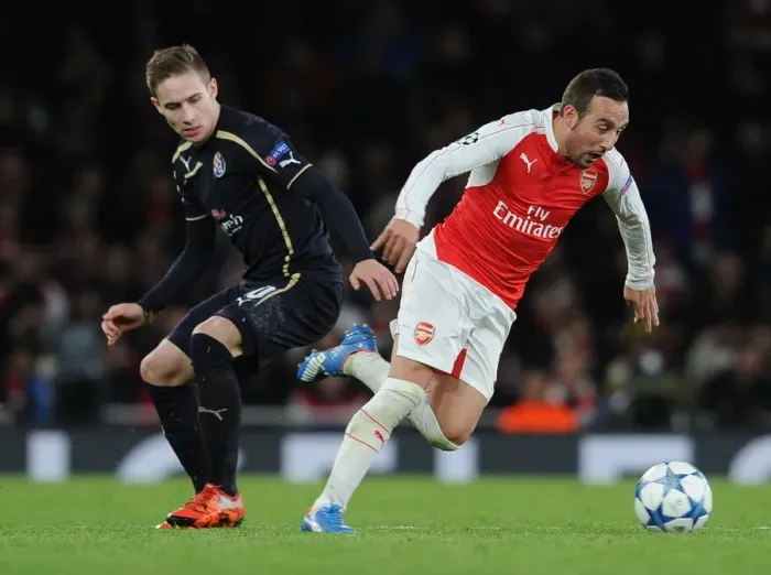 Framed Print : Arsenal's Santi Cazorla Outshines Marko Rog: A Dazzling Moment from the 2015-16 Champions League Clash