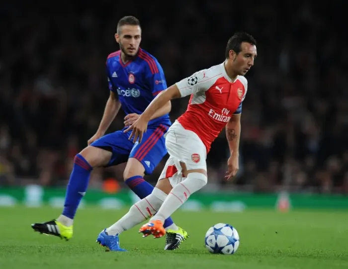Framed Print : Arsenal's Santi Cazorla Outsmarts Olympiacos Pajtim Kasami in Thrilling 2015 / 16 Champions League Showdown