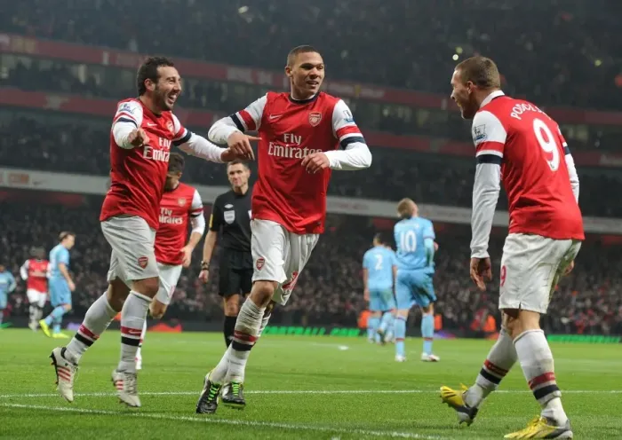 Framed Print : Arsenal's Santi Cazorla Scores, Celebrates with Gibbs and Podolski vs. West Ham United (2013) Framed Print : Arsenal's Santi Cazorla Scores, Celebrates with Gibbs and Podolski vs. West Ham United (2013)