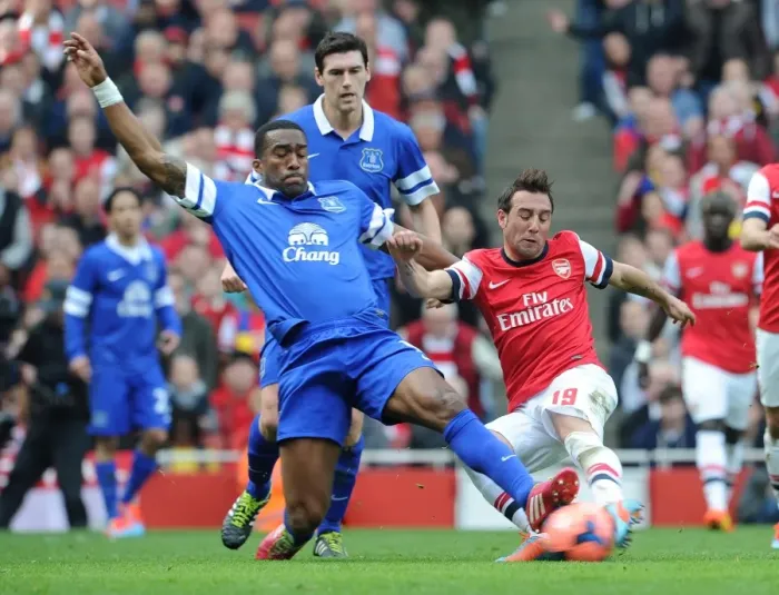 Framed Print : Arsenal's Santi Cazorla vs. Everton's Sylvain Distin: A FA Cup Quarter-Final Battle