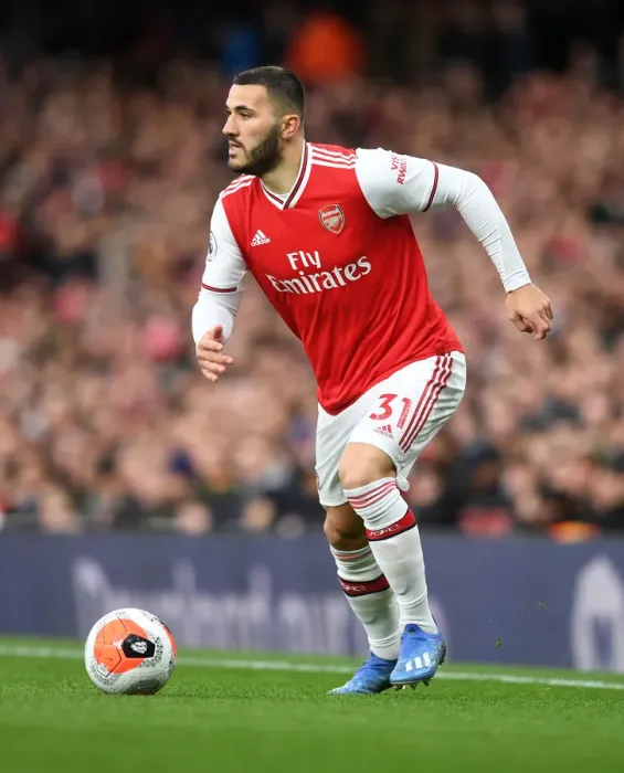 Framed Print : Arsenal's Sead Kolasinac in Action Against Everton in Premier League