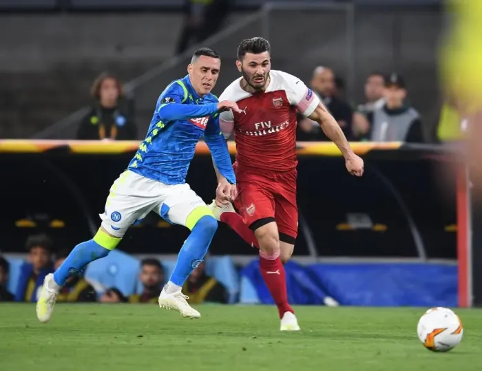 Framed Print : Arsenal's Sead Kolasinac Battles Past Napoli's Jose Callejon in Europa League Quarterfinal Framed Print : Arsenal's Sead Kolasinac Battles Past Napoli's Jose Callejon in Europa League Quarterfinal