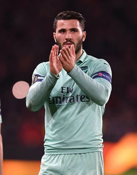 Arsenal's Sead Kolasinac Celebrates with Fans after Europa League Victory over Stade Rennais