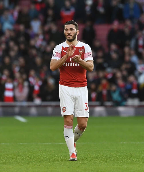 Arsenal's Sead Kolasinac Celebrates with Fans after Victory over Burnley
