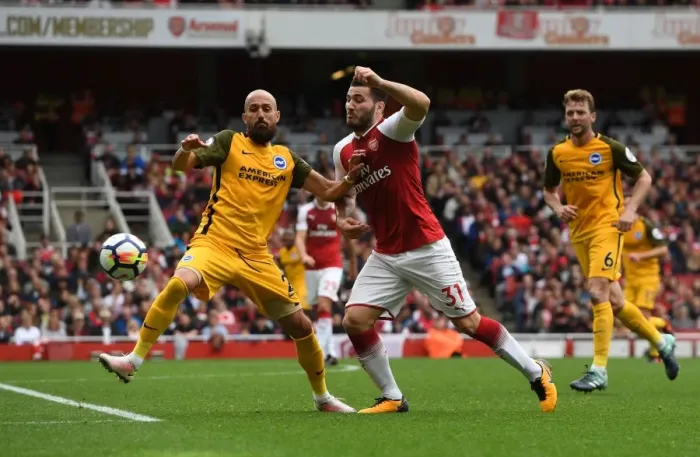 Framed Print : Arsenal's Sead Kolasinac Clashes with Brighton's Bruno Saltor in Premier League Showdown Framed Print : Arsenal's Sead Kolasinac Clashes with Brighton's Bruno Saltor in Premier League Showdown