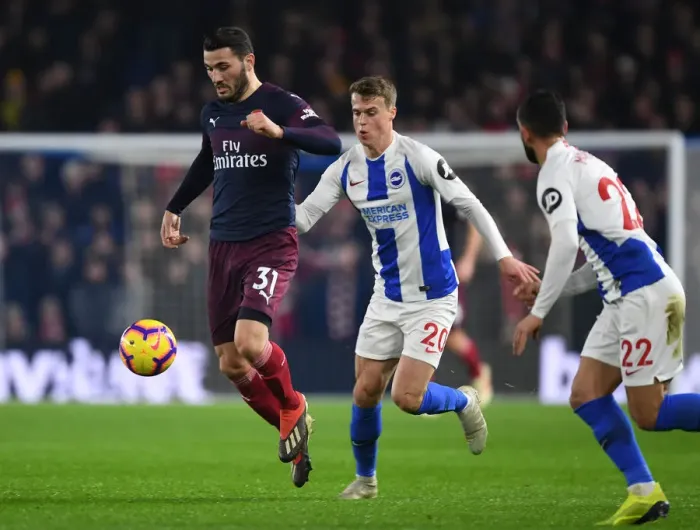 Framed Print : Arsenal's Sead Kolasinac Outmaneuvers Brighton's Defense in Premier League Clash