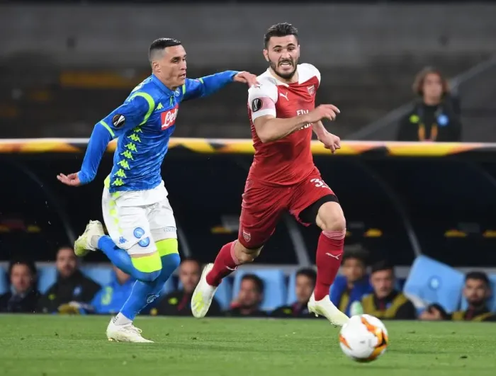 Framed Print : Arsenal's Sead Kolasinac Overpowers Jose Callejon in Europa League Quarterfinal Clash