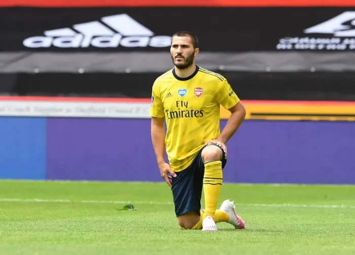 Framed Print : Arsenal's Sead Kolasinac Takes a Knee Before FA Cup Quarterfinal vs Sheffield United