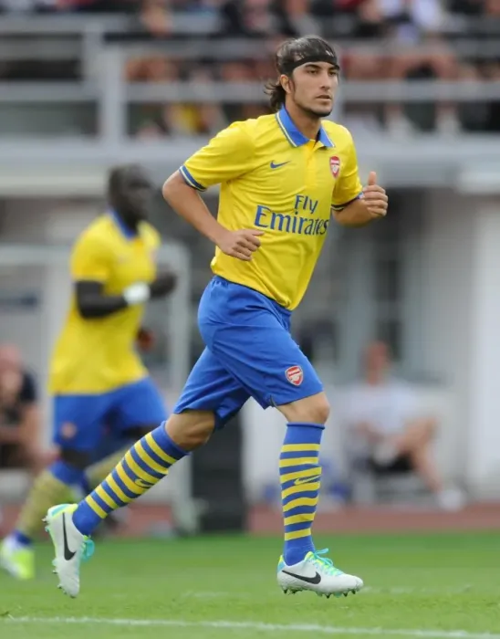 Framed Print : Arsenal's Sebastien Perez Goes Head-to-Head with Manchester City in 2013 Pre-Season Clash