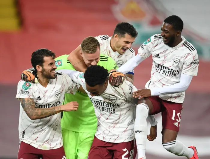 Framed Print : Arsenal's Shock Carabao Cup Victory at Empty Anfield: Celebrating Against Liverpool