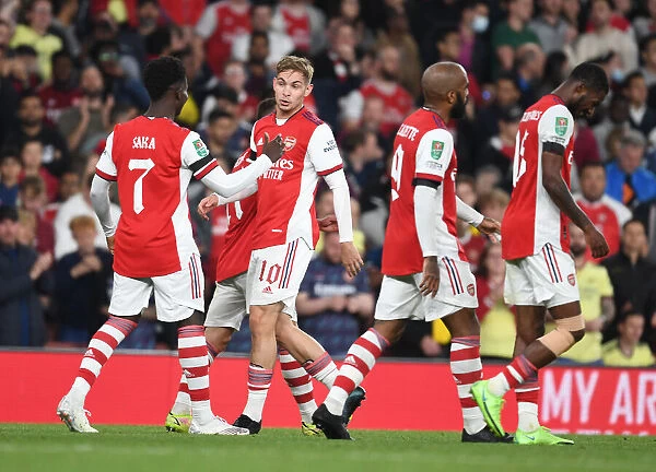 Arsenal's Smith Rowe and Saka Celebrate Goals Against AFC Wimbledon in Carabao Cup