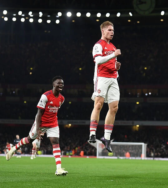 Arsenal's Smith Rowe and Saka: Celebrating Goals in Premier League Victory over West Ham