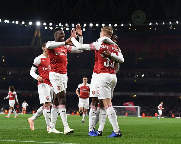 Arsenal's Smith Rowe and Welbeck: Celebrating Their Goals in Carabao Cup Victory over Blackpool