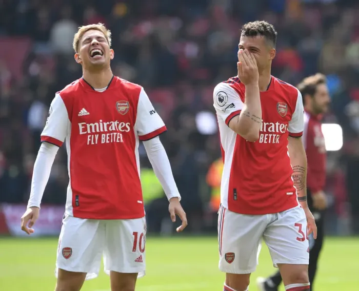 Framed Print : Arsenal's Smith Rowe and Xhaka Celebrate Victory Over Manchester United in 2021-22 Premier League Framed Print : Arsenal's Smith Rowe and Xhaka Celebrate Victory Over Manchester United in 2021-22 Premier League