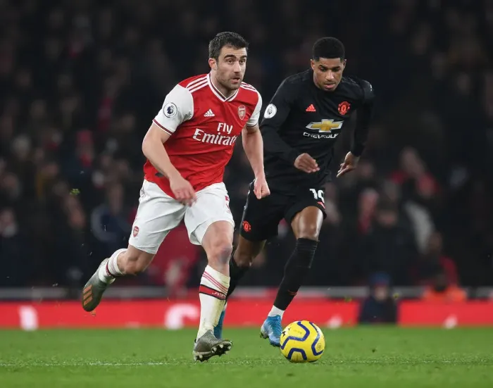 Framed Print : Arsenal's Sokratis Battles Past Rashford in Intense Arsenal v Manchester United Clash (2019-20) Framed Print : Arsenal's Sokratis Battles Past Rashford in Intense Arsenal v Manchester United Clash (2019-20)