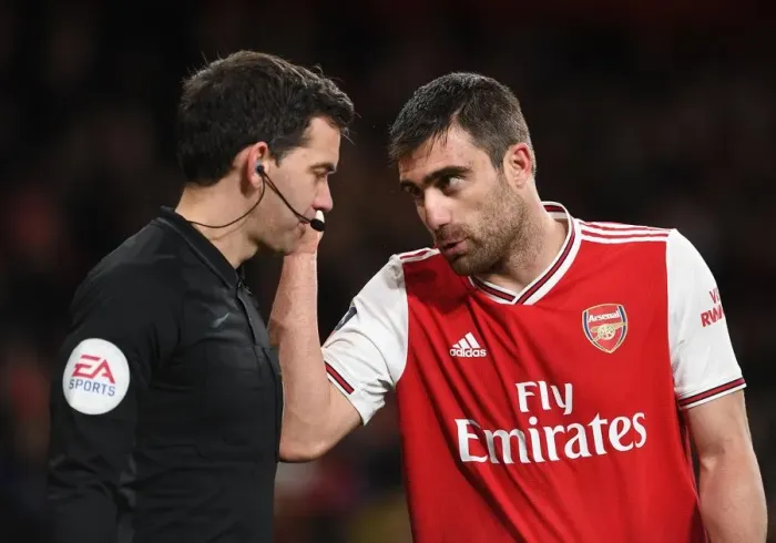 Framed Print : Arsenal's Sokratis in Deep Discussion with FA Cup Linesman: A Pivotal Moment during Arsenal vs Leeds United Framed Print : Arsenal's Sokratis in Deep Discussion with FA Cup Linesman: A Pivotal Moment during Arsenal vs Leeds United