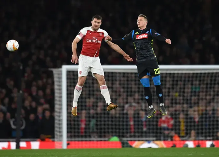 Framed Print : Arsenal's Sokratis Denies Zielinski in Europa League Quarterfinal Showdown