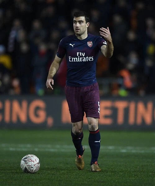 Arsenal's Sokratis in FA Cup Action against Blackpool at Bloomfield Road