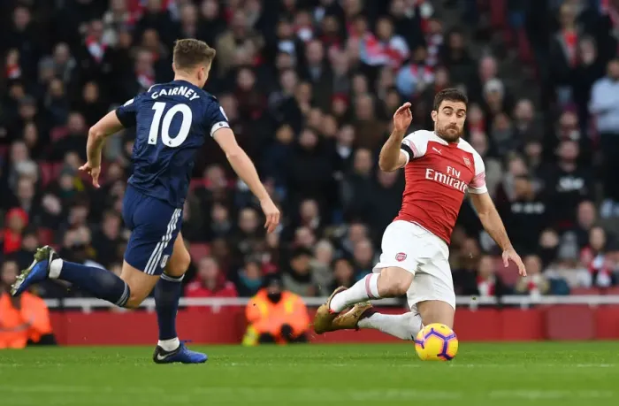 Framed Print : Arsenal's Sokratis Fends Off Fulham's Tom Cairney: Premier League Clash at Emirates Stadium Framed Print : Arsenal's Sokratis Fends Off Fulham's Tom Cairney: Premier League Clash at Emirates Stadium