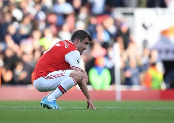 Framed Print : Arsenal's Sokratis Reacts After Arsenal vs. Tottenham Premier League Clash (2019-20)