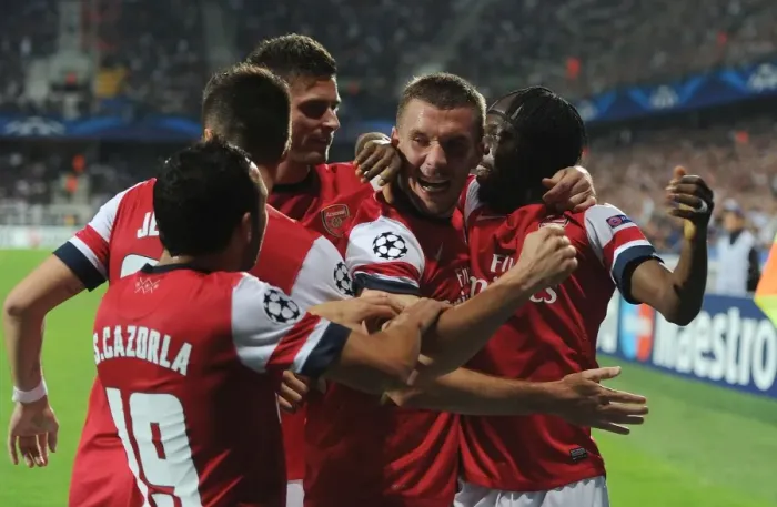 Framed Print : Arsenal's Star Players Celebrate Goals Against Montpellier in 2012-13 Champions League