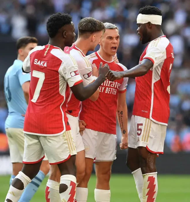 Framed Print : Arsenal's Stars: Trossard, Saka, Tierney, Partey Celebrate Goal Against Manchester City - FA Community Shield 2023-24