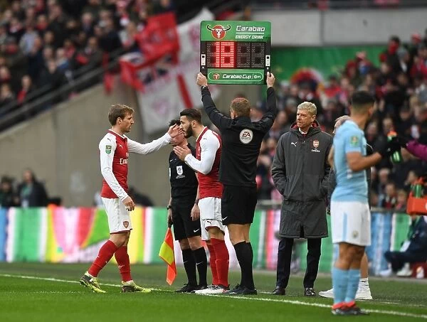 Arsenal's Substitution: Nacho Monreal Off, Sead Kolasinac On during Arsenal v Manchester City - Carabao Cup Final 2018