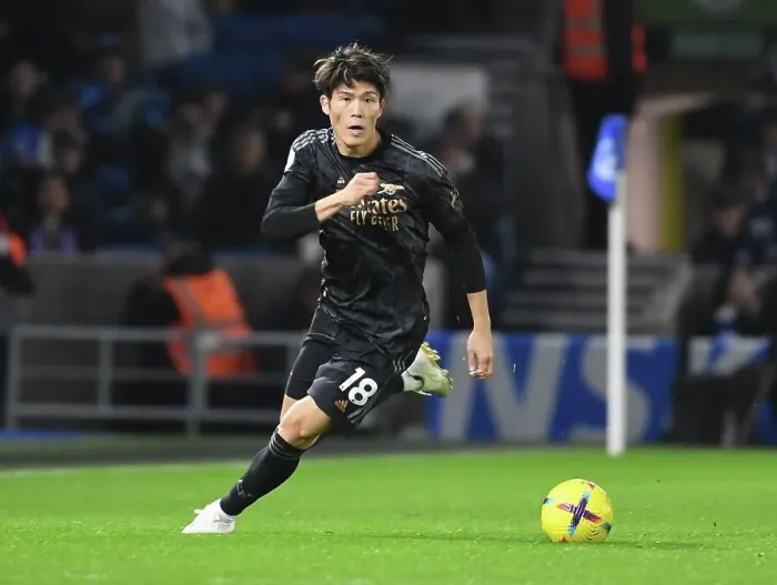 Framed Print : Arsenal's Takihiro Tomiyasu Faces Off Against Brighton in Premier League Clash