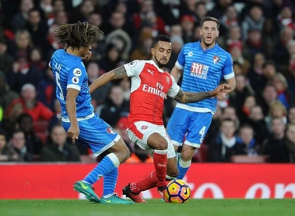 Arsenal's Theo Walcott Clashes with Bournemouth's Nathan Ake in Premier League Showdown