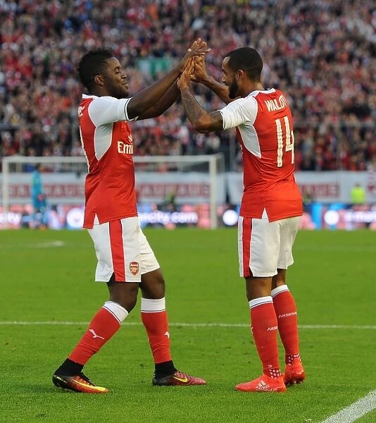 Arsenal's Theo Walcott and Joel Campbell Celebrate Goal Against Manchester City (2016-17 Pre-Season)