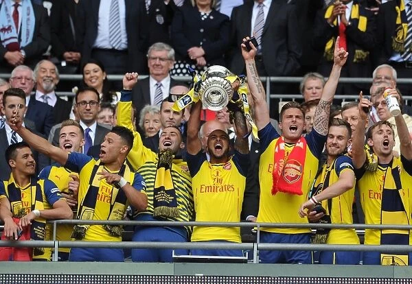 Arsenal's Theo Walcott and Olivier Giroud Celebrate FA Cup Victory