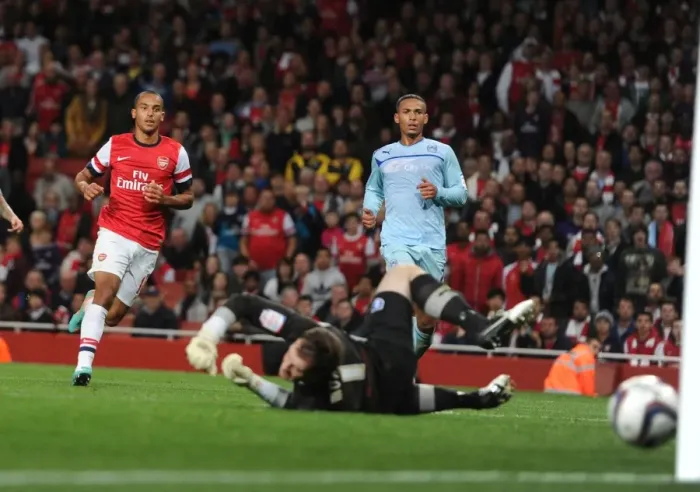 Framed Print : Arsenal's Theo Walcott Scores Brace in Capital One Cup Victory over Coventry City