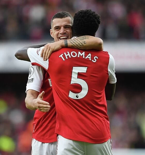 Arsenal's Thomas Partey and Grant Xhaka Celebrate Goals Against Nottingham Forest (2022-23)