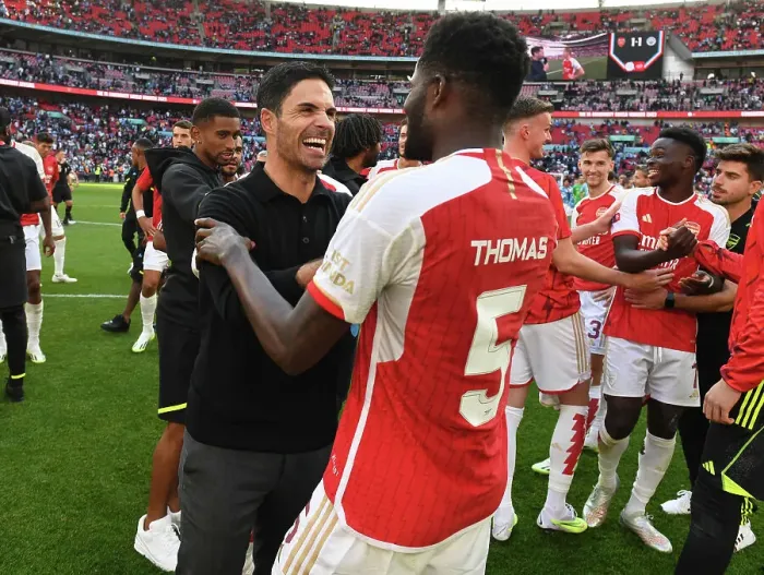 Framed Print : Arsenal's Thomas Partey and Mikel Arteta Celebrate FA Community Shield Victory over Manchester City Framed Print : Arsenal's Thomas Partey and Mikel Arteta Celebrate FA Community Shield Victory over Manchester City