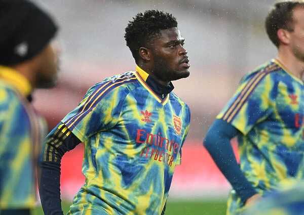 Arsenal's Thomas Partey Prepares for Manchester United Clash in Empty Old Trafford (2020-21 Premier League)