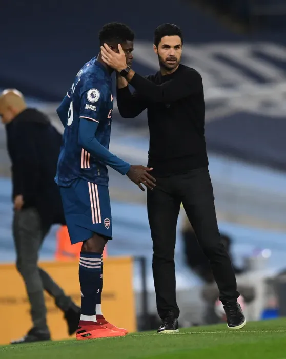 Framed Print : Arsenal's Thomas Partey Receives Strategic Guidance from Mikel Arteta during Manchester City Match (2020-21) Framed Print : Arsenal's Thomas Partey Receives Strategic Guidance from Mikel Arteta during Manchester City Match (2020-21)