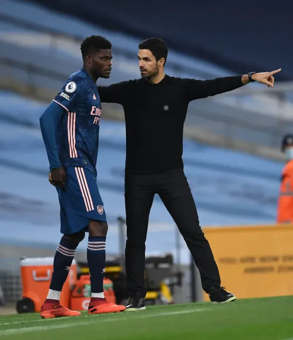Framed Print : Arsenal's Thomas Partey Receives Tactical Instructions from Mikel Arteta during Manchester City Showdown (Premier League 2020-21) Framed Print : Arsenal's Thomas Partey Receives Tactical Instructions from Mikel Arteta during Manchester City Showdown (Premier League 2020-21)