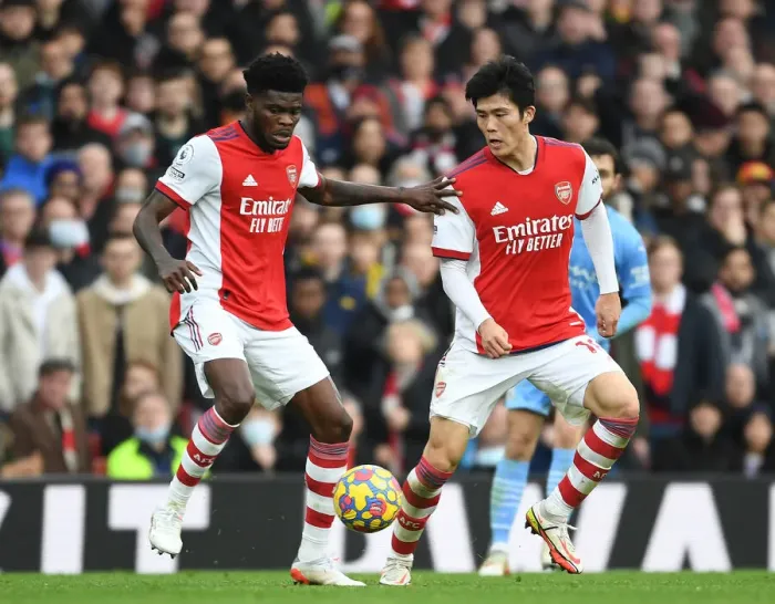 Framed Print : Arsenal's Thomas Partey and Takehiro Tomiyasu in Action against Manchester City - Premier League 2021-22