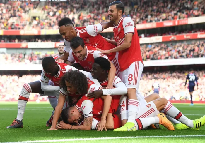 Framed Print : Arsenal's Thrilling Team Goal: David Luiz Scores and Celebrates with Team against AFC Bournemouth (2019-20)