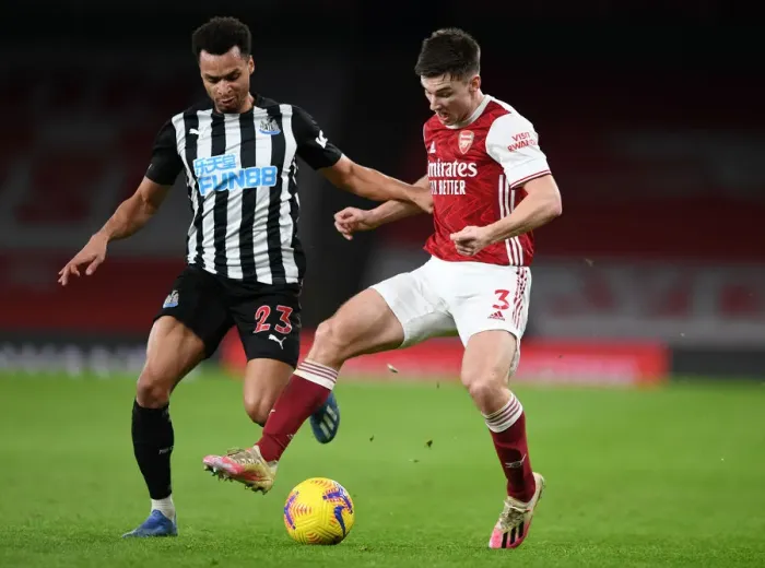 Framed Print : Arsenal's Tierney Stands Out in Empty Emirates: Arsenal vs Newcastle United, Premier League 2020-21
