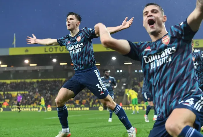 Framed Print : Arsenal's Tierney and Xhaka: Double Strike Celebration vs Norwich City (December 2021)