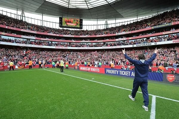 Arsenal's Tomas Rosicky Celebrates with Fans: Arsenal's Victory over Aston Villa (2015-16)